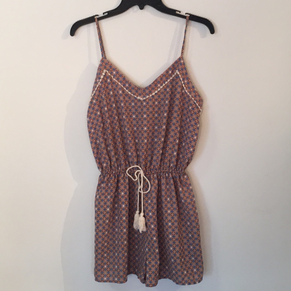 Peach and blue pattern romper.